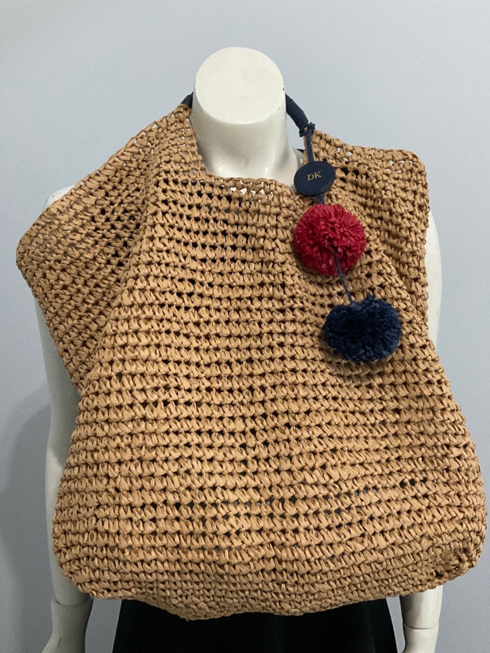 Mark & Graham Tan Woven Raffia Tote with Red and Navy Pom-Pom Charms